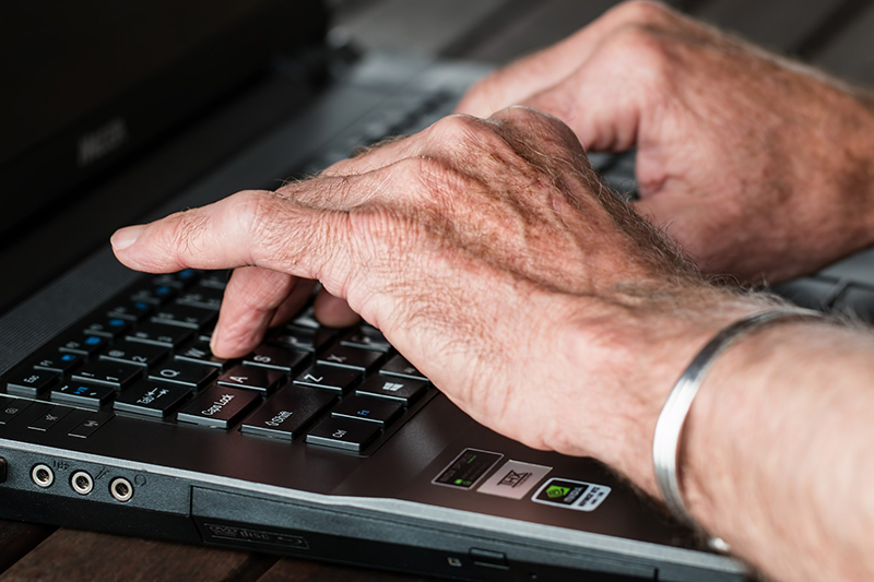 A Digital Support Volunteer using a computer