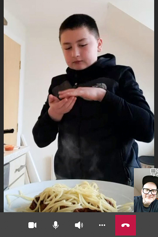 A young person in Positive Transitions befriending cooking pasta