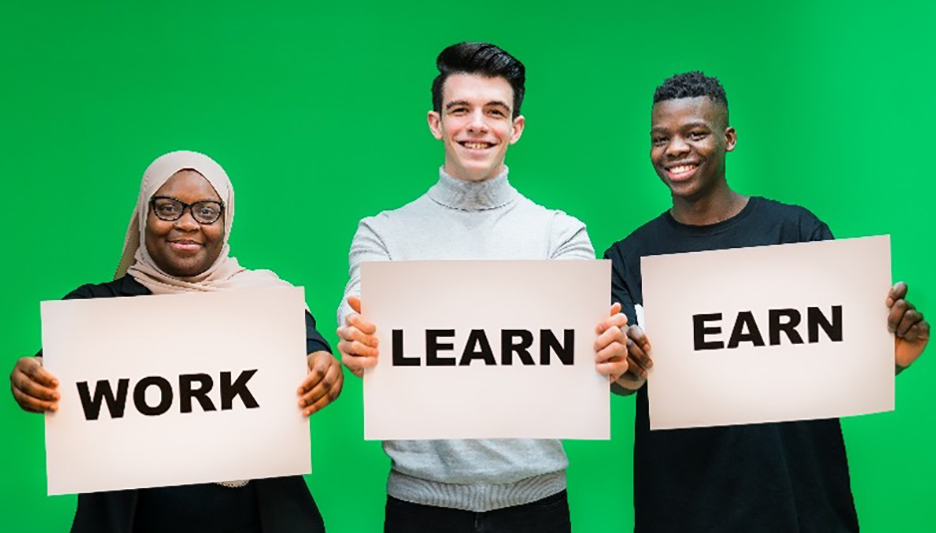 Three people holding up signs: Work Learn Earn