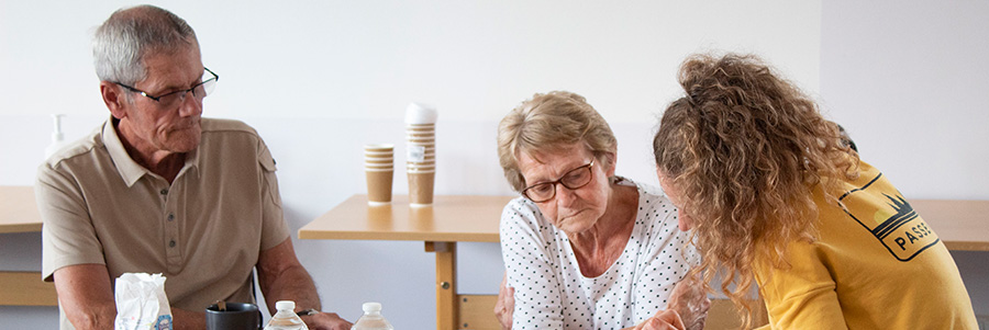 A Reconnect Digital & Wellbeing Coordinator supporting people to use digital devices