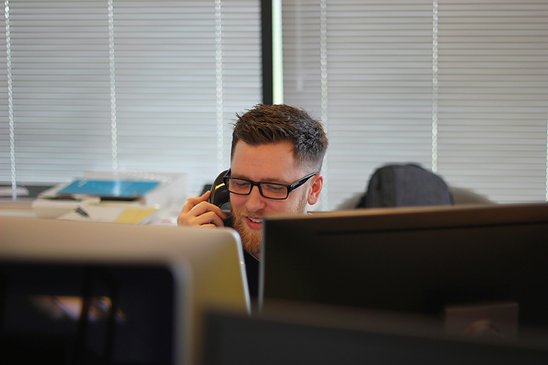 A Digital Support Volunteer using a computer